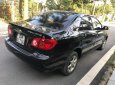 Toyota Corolla J 1.3 MT 2003 - Bán Toyota Corolla J 1.3 MT đời 2003, màu đen như mới