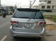 Toyota Fortuner G 2014 - Cần bán lại xe Toyota Fortuner G năm 2014, màu bạc xe gia đình