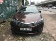 Toyota Corolla altis 1.8G 2015 - Bán Toyota Corolla altis G đời 2015, màu nâu, xe gia đình