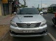 Toyota Fortuner G 2014 - Cần bán lại xe Toyota Fortuner G năm 2014, màu bạc xe gia đình