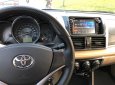 Toyota Vios 1.5E 2014 - Bán Toyota Vios 1.5E đời 2014, màu vàng số sàn, 415 triệu