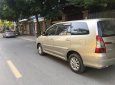 Toyota Innova E 2014 - Gia đình mình bán xe Toyota Innova 2.0E màu ghi vàng, sx cuối 2014, chính chủ gia đình từ đầu