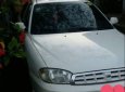 Kia Spectra 2005 - Cần bán gấp Kia Spectra đời 2005, màu trắng như mới