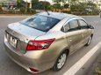 Toyota Vios 1.5E 2014 - Bán Toyota Vios 1.5E đời 2014, màu vàng số sàn, 415 triệu