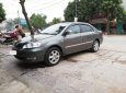 Toyota Corolla altis 1.8G MT 2005 - Cần bán gấp Toyota Corolla altis 1.8G MT sản xuất 2005, màu xám