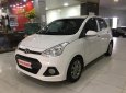 Hyundai Grand i10 2015 - Cần bán lại xe Hyundai Grand i10 đời 2015, màu trắng, xe nhập chính chủ