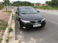 Kia Forte EX 2011 - Cần bán Kia Forte sản xuất 2011 màu đen, giá tốt