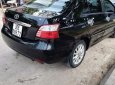 Toyota Vios E 2010 - Cần bán lại xe Toyota Vios E năm sản xuất 2010, màu đen