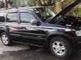 Ford Escape    2004 - Bán ô tô Ford Escape sản xuất 2004, màu đen còn mới, giá chỉ 195 triệu