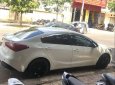 Kia K3 MT 2015 - Kẹt tiền cần bán xe K3 2015, xe chính chủ, màu trắng