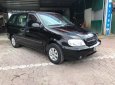 Kia Carnival GS 2006 - Cần bán xe Kia Carnival năm 2006 màu đen, giá chỉ 220 triệu, nhập khẩu