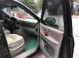 Kia Carnival GS 2006 - Cần bán xe Kia Carnival năm 2006 màu đen, giá chỉ 220 triệu, nhập khẩu