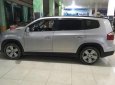 Chevrolet Orlando 2013 - Bán Chevrolet Orlando sản xuất năm 2013, màu bạc xe gia đình, 395tr