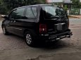 Kia Carnival 2006 - Cần bán lại xe Kia Carnival năm 2006 màu đen, giá tốt nhập khẩu