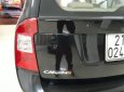 Kia Carens 2010 - Cần bán gấp Kia Carens sản xuất 2010, màu đen số tự động