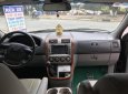 Kia Carnival 2006 - Cần bán lại xe Kia Carnival năm 2006 màu đen, giá tốt nhập khẩu