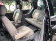 Kia Carnival 2006 - Cần bán lại xe Kia Carnival năm 2006 màu đen, giá tốt nhập khẩu