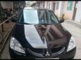 Mitsubishi Lancer 2004 - Bán xe Mitsubishi Lancer 2004, màu đen xe gia đình, 232 triệu