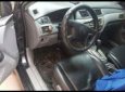 Mitsubishi Lancer 2004 - Bán xe Mitsubishi Lancer 2004, màu đen xe gia đình, 232 triệu