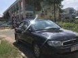 Kia Spectra   LS 1.6 2005 - Bán xe Kia Spectra LS 1.6 sản xuất 2005, màu đen số sàn, 167tr