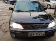 Ford Laser GHIA 1.8 MT 2003 - Cần bán lại xe Ford Laser GHIA 1.8 MT sản xuất 2003, màu đen, 165tr