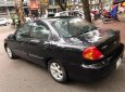 Kia Spectra LS 2004 - Bán Kia Spectra LS sản xuất 2004, màu đen xe gia đình, giá tốt