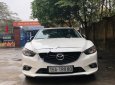 Mazda 6 2.0 AT 2015 - Cần bán Mazda 6 2.0 AT sản xuất 2015, màu trắng số tự động