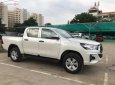 Toyota Hilux 2.4E 4x2 AT 2019 - Cần bán xe Toyota Hilux 2.4E 4x2 AT đời 2019, màu trắng, nhập khẩu 