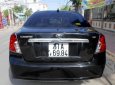 Daewoo Lacetti EX 1.6MT 2010 - Cần bán lại xe Daewoo Lacetti EX 1.6MT sản xuất 2010, màu đen số sàn, giá 275tr