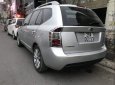 Kia Carens MT 2011 - Cần bán lại xe Kia Carens MT năm 2011, màu bạc xe gia đình