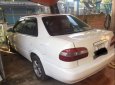 Toyota Corolla 1.3 2001 - Bán Toyota Corolla 1.3 2001, màu trắng còn mới, giá 120tr