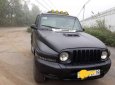 Ssangyong Korando   2003 - Gia đình bán Ssangyong Korando năm 2003, màu đen, nhập khẩu