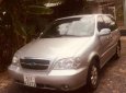 Kia Carnival 2005 - Bán ô tô Kia Carnival năm 2005, màu bạc, nhập khẩu xe gia đình