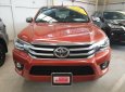 Toyota Hilux 2.8G 4x4 AT 2016 - (Hãng) bán xe Toyota Hilux 2.8G 4x4 AT sản xuất 2016, màu cam, nhập khẩu