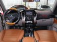 Mitsubishi Pajero Sport 2.5MT 2015 - Cần bán Mitsubishi Pajero Sport 2.5MT 2015, màu ghi vàng, giá 646tr