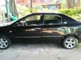 Toyota Corolla altis  MT 2003 - Cần bán lại xe Toyota Corolla Altis MT đời 2003, màu đen, xe nhà chạy rất kỹ