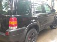 Ford Escape   2003 - Cần bán gấp Ford Escape đời 2003, màu đen, xe gia đình 