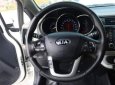 Kia Rio 1.4AT 2015 - Cần bán gấp Kia Rio 1.4AT đời 2015, màu trắng, xe nhập 