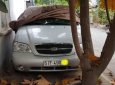 Kia Carnival 2005 - Bán Kia Carnival đời 2005, màu bạc, giá chỉ 230 triệu