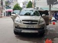 Chevrolet Captiva MT 2007 - Cần bán gấp Chevrolet Captiva MT năm 2007, màu vàng cát