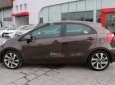 Kia Rio  1.4AT   2015 - Cần bán xe Kia Rio 1.4AT 2015, màu nâu, xe nguyên bản