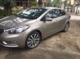 Kia K3 2015 - Cần bán Kia K3 năm sản xuất 2015, màu vàng, giá 450tr