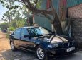 BMW 3 Series  318i  2004 - Cần bán lại xe BMW 3 Series 318i sản xuất năm 2004, màu đen, xe đẹp