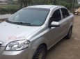 Daewoo Gentra 2010 - Cần bán gấp Daewoo Gentra đời 2010, màu bạc xe gia đình