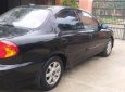 Kia Spectra 2005 - Cần bán xe cũ Kia Spectra 2005, màu đen như mới