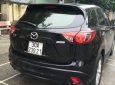 Mazda CX 5  AT  2014 - Cần bán lại xe Mazda CX 5 AT đời 2014, màu đen chính chủ, giá chỉ 696 triệu