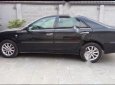 Toyota Camry 2003 - Bán Toyota Camry đời 2003, màu đen, còn rất đẹp, đi xa tốt