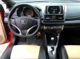 Toyota Yaris 1.3E 2015 - Bán xe Toyota Yaris 1.3E 2015, màu đỏ, số tự động, lăn bánh 4000 km