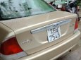 Ford Laser Delu 1.6 MT 2001 - Cần bán Ford Laser Delu 1.6 MT sản xuất 2001, màu ghi vàng, giá tốt