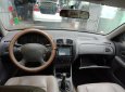 Ford Laser Delu 1.6 MT 2001 - Cần bán Ford Laser Delu 1.6 MT sản xuất 2001, màu ghi vàng, giá tốt